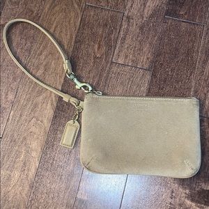 Suede tan Coach wristlet